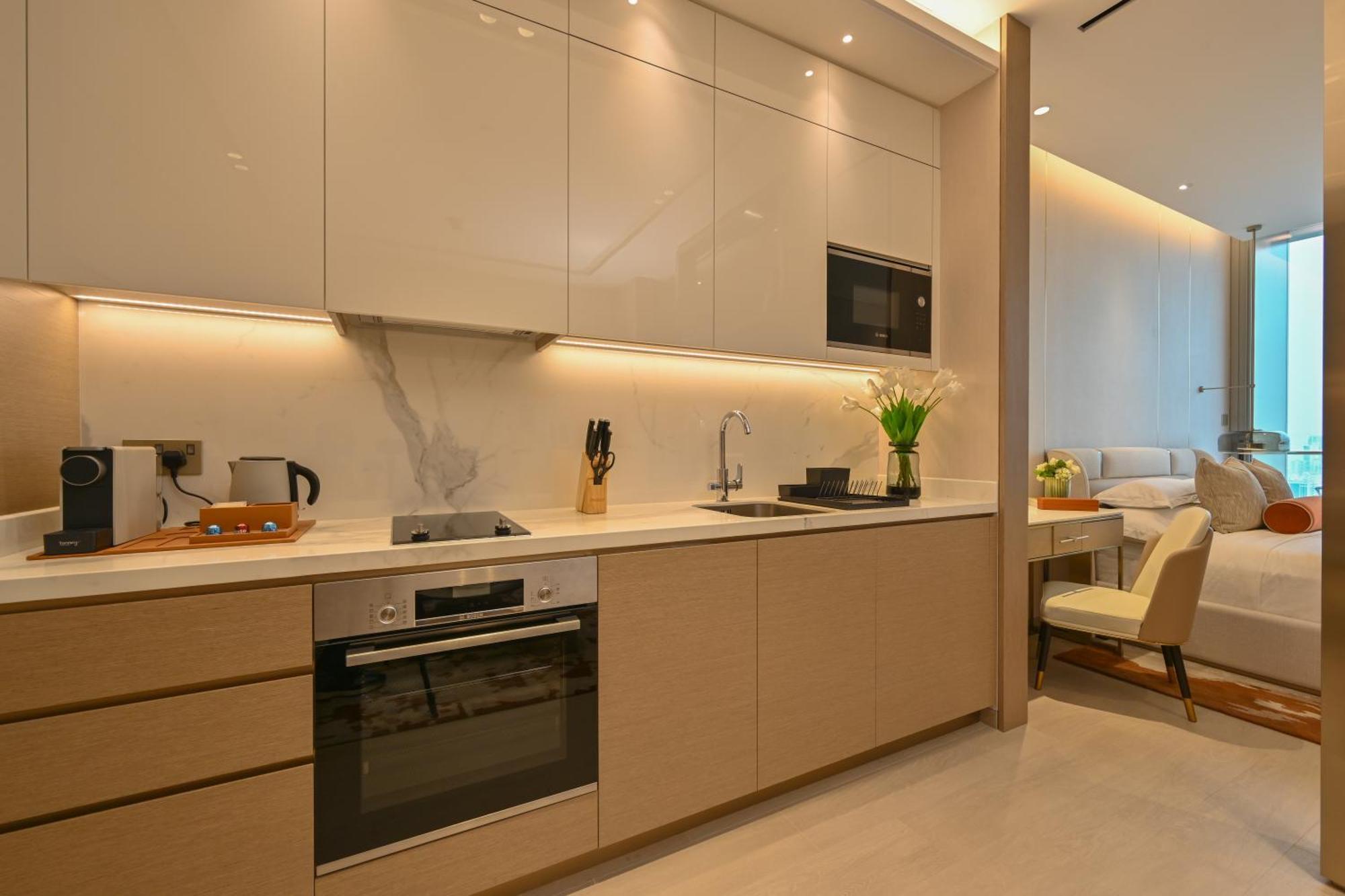 Onyx Rotana Hotel Manama Exterior foto A kitchen in a serviced apartment in Hong Kong